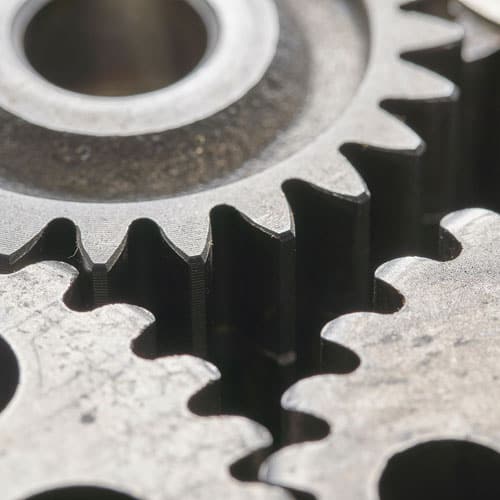 image of metal cogs fitting perfectly